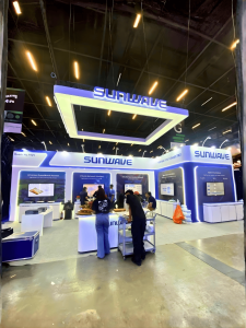 This image showcases a modern exhibition stand built by Interior Today for a trade show in Brazil with attractive branding and professional booth design.